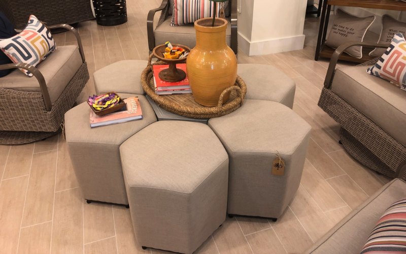 These ottomans in Inspired Visions by Peak Season’s Paxton collection can be separated to pull closer to a sofa or serve as additional seating. There is also a table collection that separates in the same way. peakseason.com