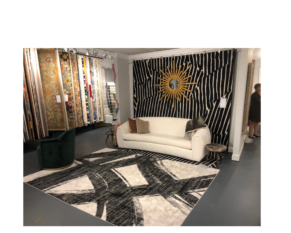 Retailers have been asking for more black and white rugs, and Momeni delivered with it's Xander(on the wall) and Nogo (on the floor) rugs. momeni.com